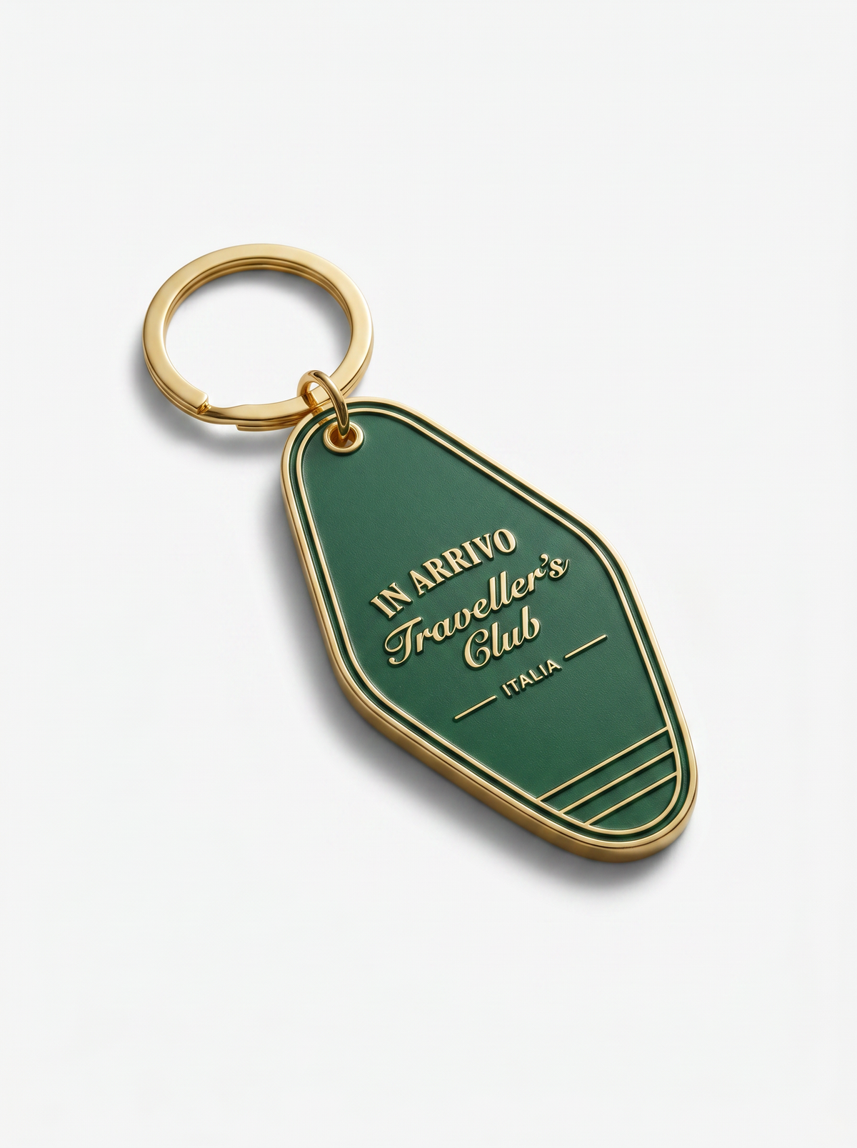 Green keychain with gold ring on a white background